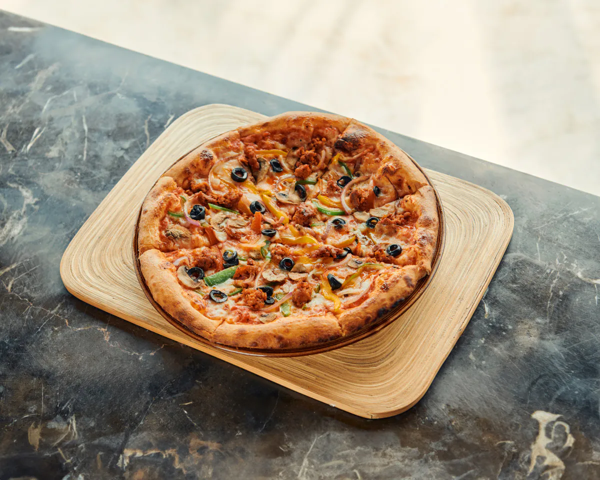 Wood-fired pizza at Sami Sami