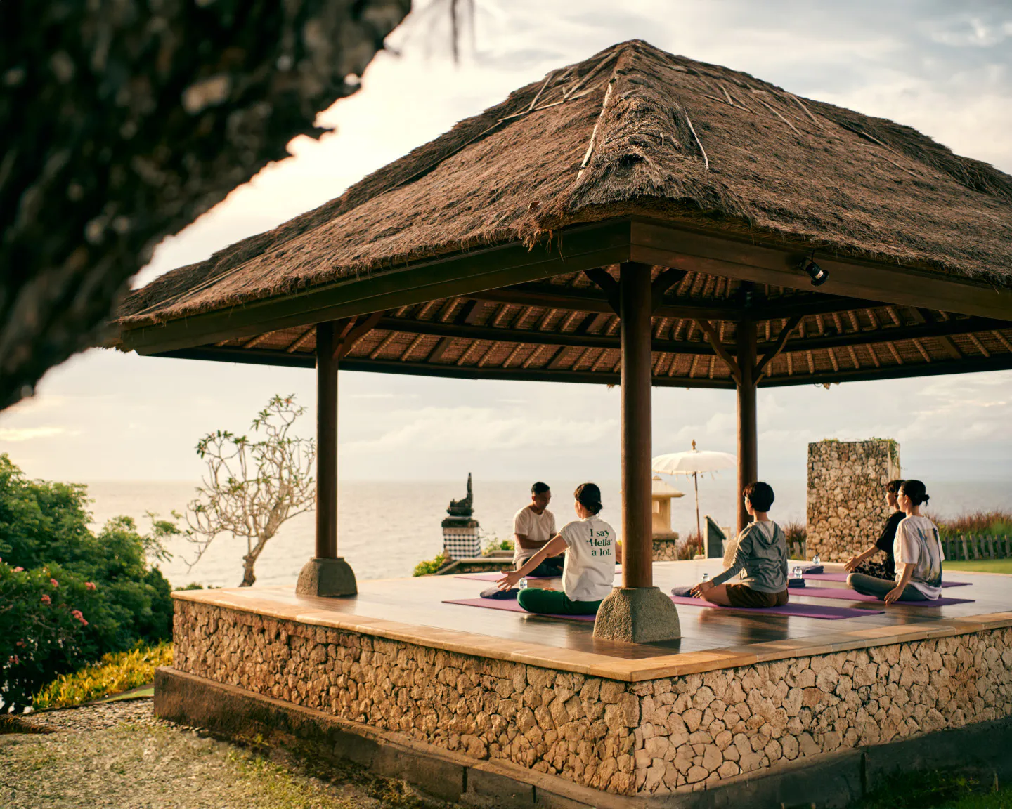 Sunrise yoga on an ocean-view deck