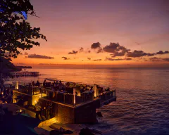 Sunset over the ocean at Rock Bar